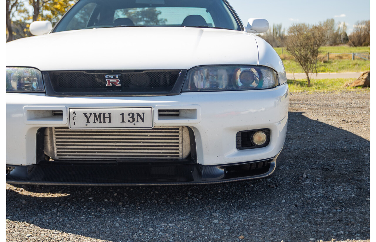 04/1997 Nissan Skyline R33 GT-R Series 3 BNR33 (AWD) 2d Coupe QM1 Polar White Turbo 2.6L - Modified 850hp+ - 05/2009 Import