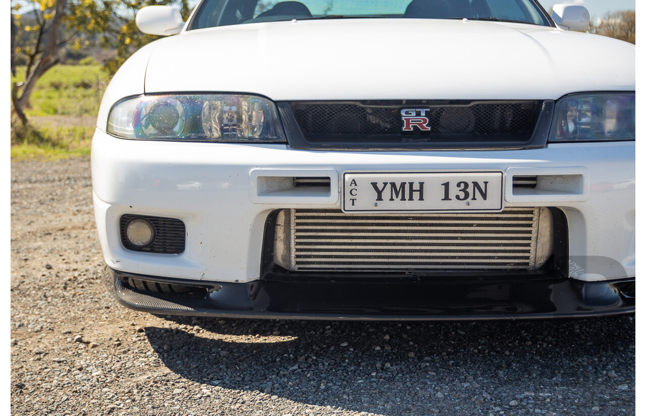 04/1997 Nissan Skyline R33 GT-R Series 3 BNR33 (AWD) 2d Coupe QM1 Polar White Turbo 2.6L - Modified 850hp+ - 05/2009 Import