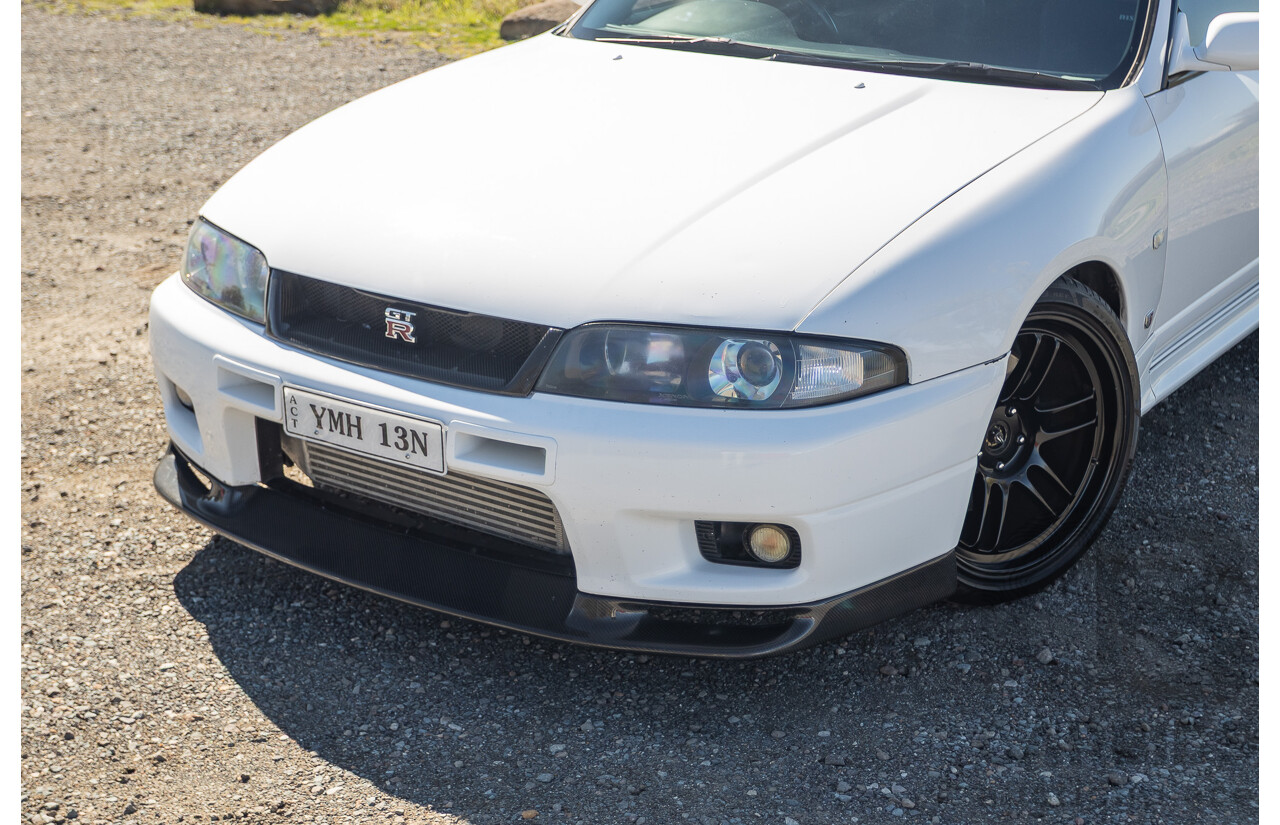 04/1997 Nissan Skyline R33 GT-R Series 3 BNR33 (AWD) 2d Coupe QM1 Polar White Turbo 2.6L - Modified 850hp+ - 05/2009 Import