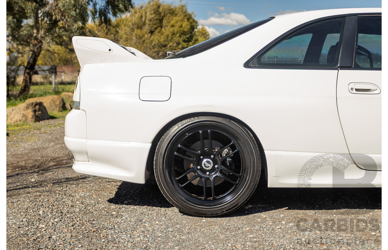 04/1997 Nissan Skyline R33 GT-R Series 3 BNR33 (AWD) 2d Coupe QM1 Polar White Turbo 2.6L - Modified 850hp+ - 05/2009 Import