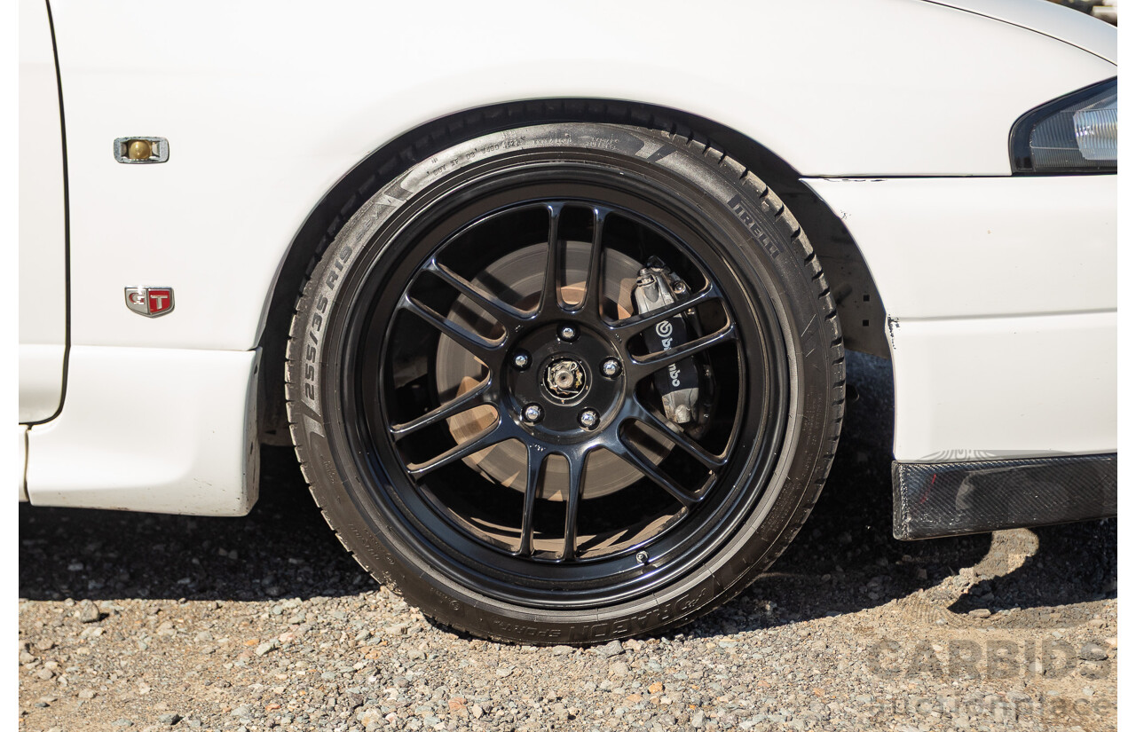 04/1997 Nissan Skyline R33 GT-R Series 3 BNR33 (AWD) 2d Coupe QM1 Polar White Turbo 2.6L - Modified 850hp+ - 05/2009 Import