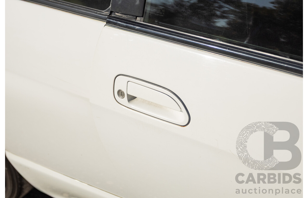 04/1997 Nissan Skyline R33 GT-R Series 3 BNR33 (AWD) 2d Coupe QM1 Polar White Turbo 2.6L - Modified 850hp+ - 05/2009 Import