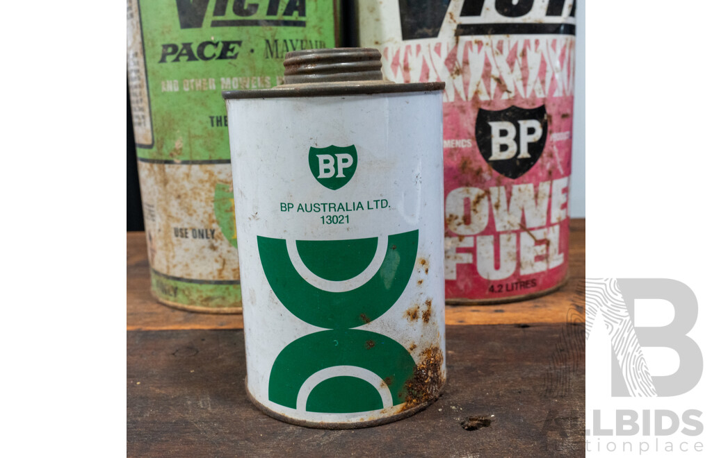 Pair of Vintage Victa Two Strike Tins and BP Example