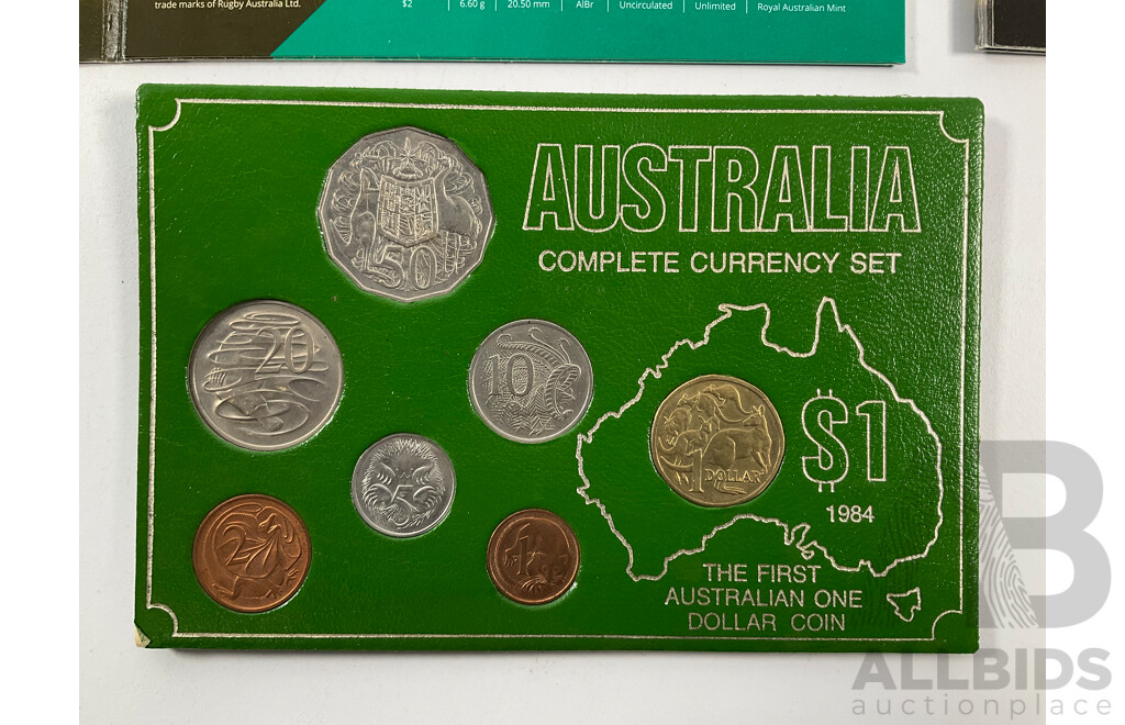 Collection of Australian UNC Coins Including 2018 Gold Plated Fifty Cent, XXI Commonwealth Games, 1984 Seven Coin Set, 2011 Two Coin Set, Australian Wool................