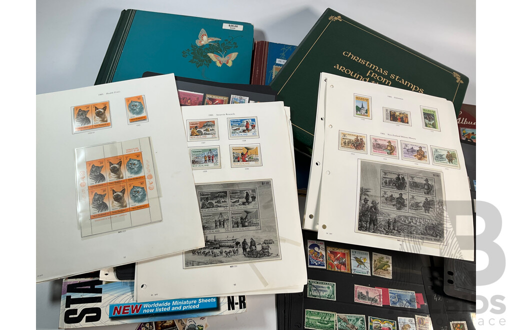 Collection of Stamp Albums Including International, New Zealand Predecimal to 1990's, 1980 Christmas Stamps From Around the World, Stanley Gibbons 2008 Stamps of the World Catalogue