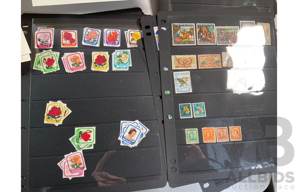 Collection of Stamp Albums Including International, New Zealand Predecimal to 1990's, 1980 Christmas Stamps From Around the World, Stanley Gibbons 2008 Stamps of the World Catalogue