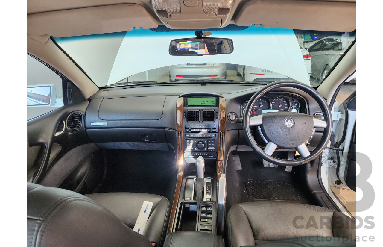 2/2005 Holden Statesman V6 WL 4d Sedan White 3.6L