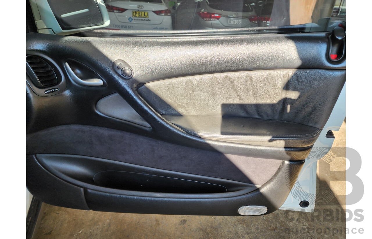 2/2005 Holden Statesman V6 WL 4d Sedan White 3.6L