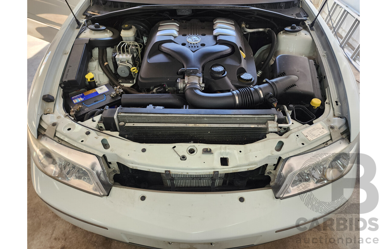 2/2005 Holden Statesman V6 WL 4d Sedan White 3.6L