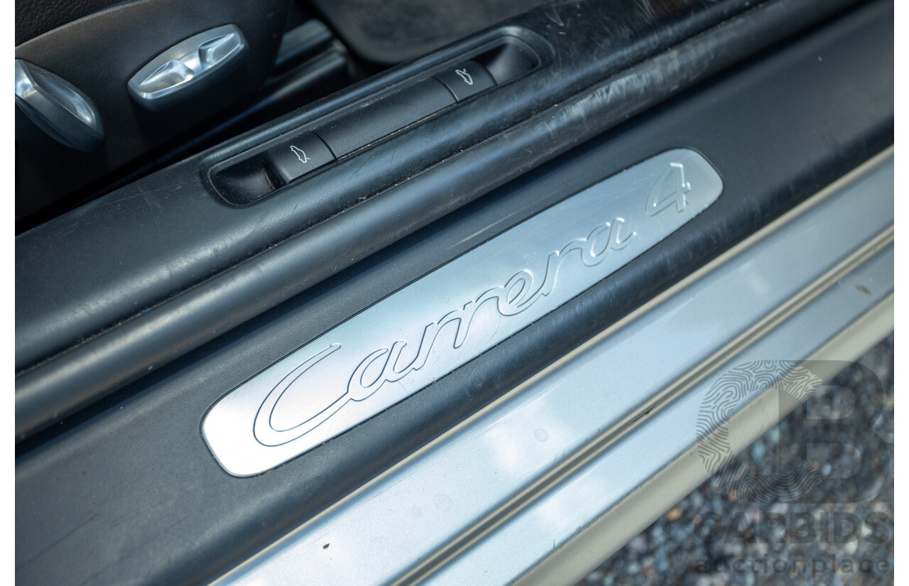 3/2006 Porsche 911 Carrera 4 997 (AWD) 2d Coupe GT Silver 3.6L