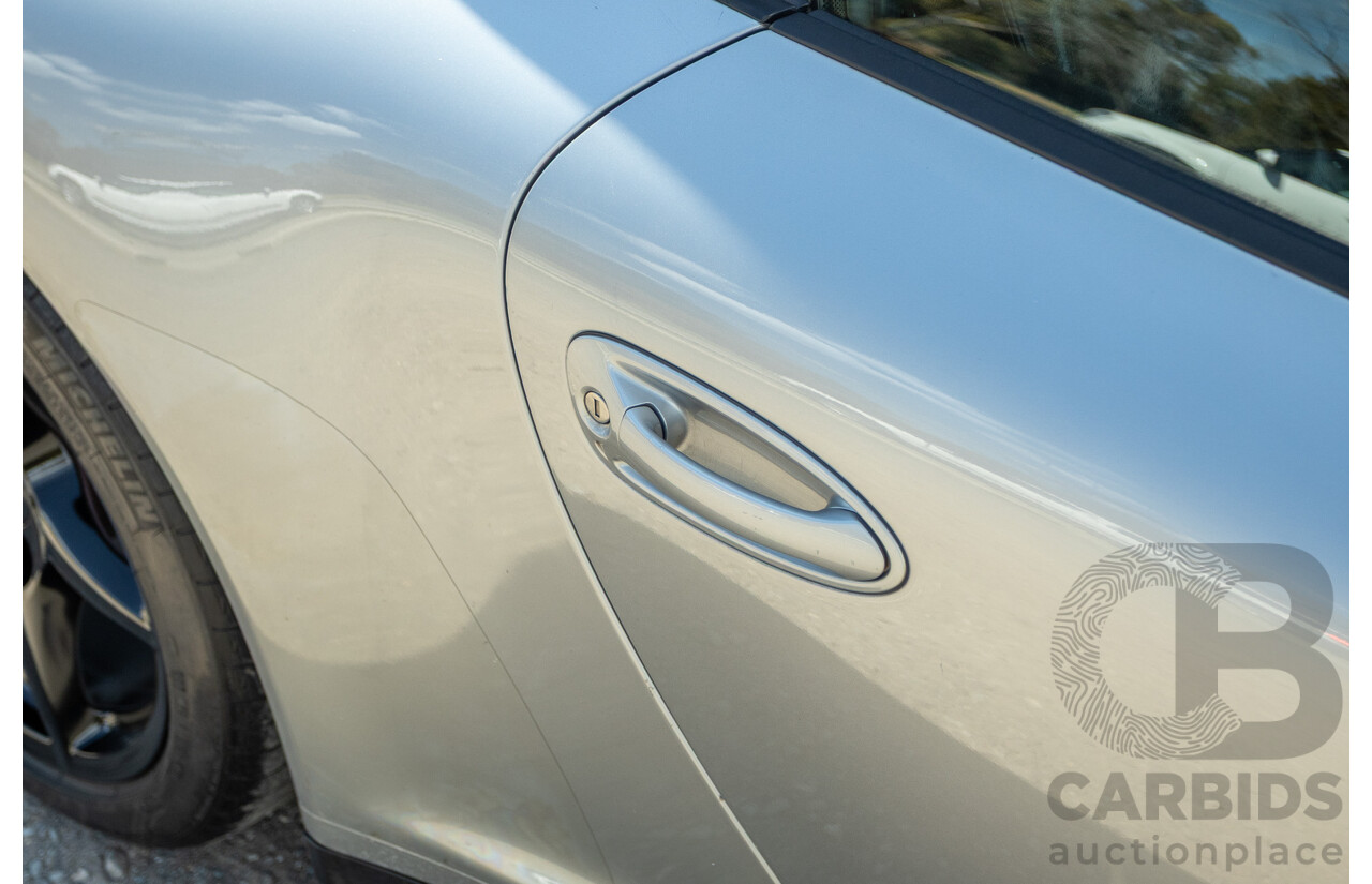 3/2006 Porsche 911 Carrera 4 997 (AWD) 2d Coupe GT Silver 3.6L