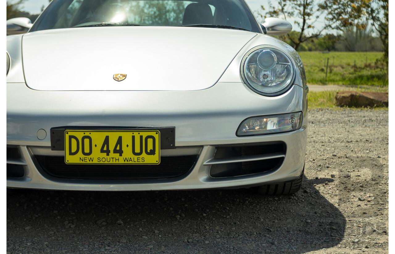 3/2006 Porsche 911 Carrera 4 997 (AWD) 2d Coupe GT Silver 3.6L