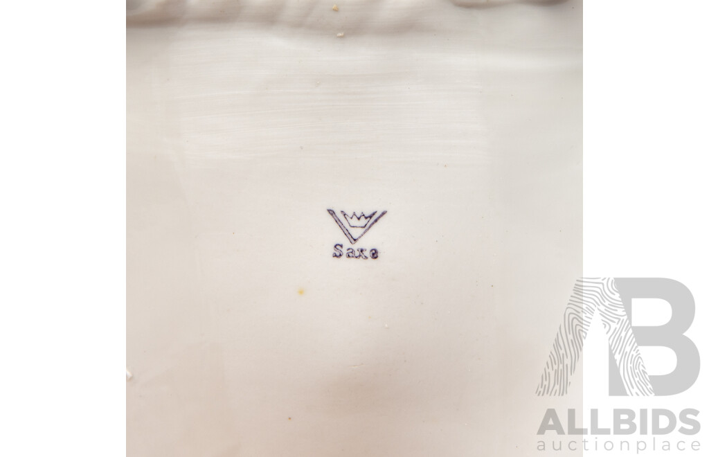 a Porcelain Inkwell with Seated Gentleman and Applied Floral Decoration, Saxe Mark, C.1900