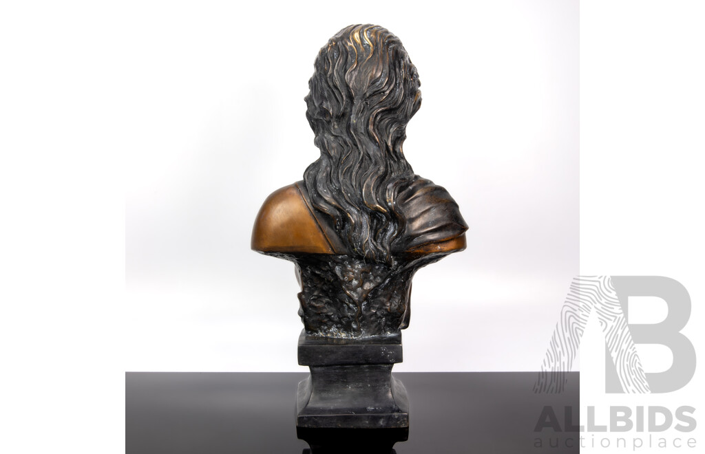 Bronze Bust of a Woman with Bared Breast and Flowing Hair