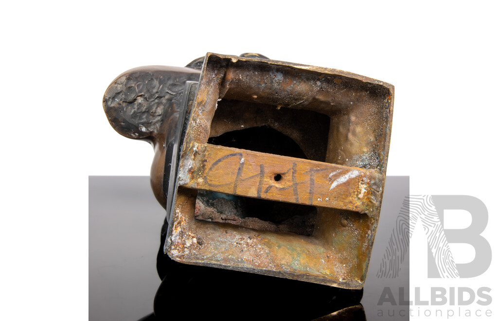 Bronze Bust of a Woman with Bared Breast and Flowing Hair