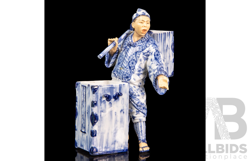 Blue Chinese Porcelain Merchant Figurine