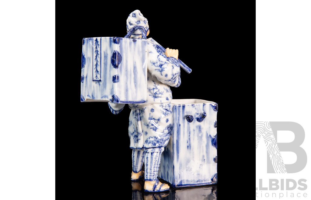 Blue Chinese Porcelain Merchant Figurine