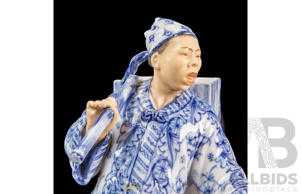 Blue Chinese Porcelain Merchant Figurine