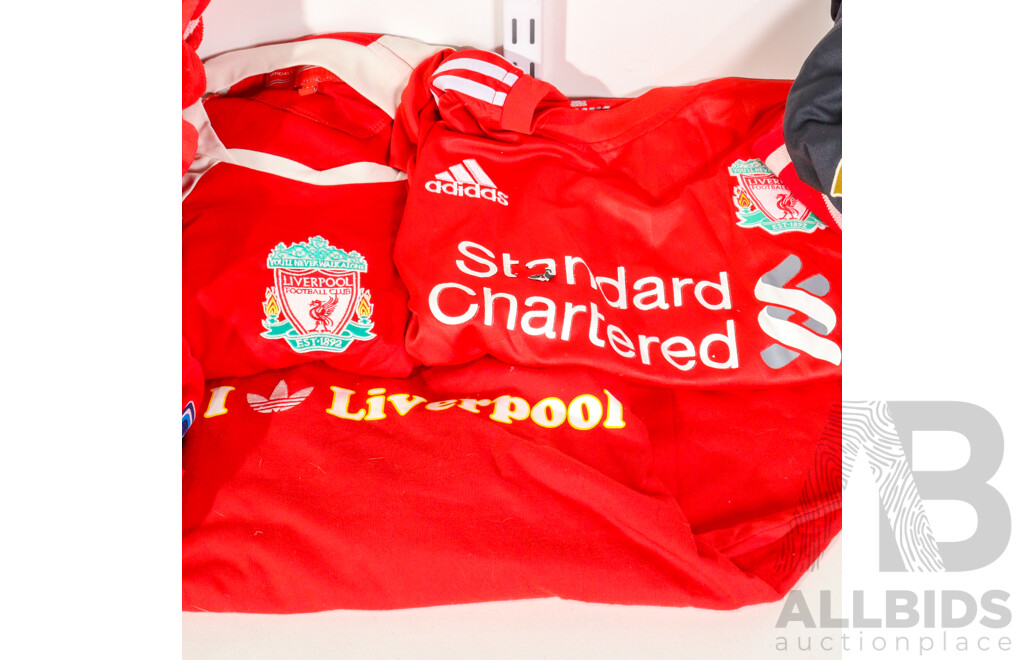 Collection of Official Liverpool Football Club Supporter Gear Including Jerseys, Scarves and Towels