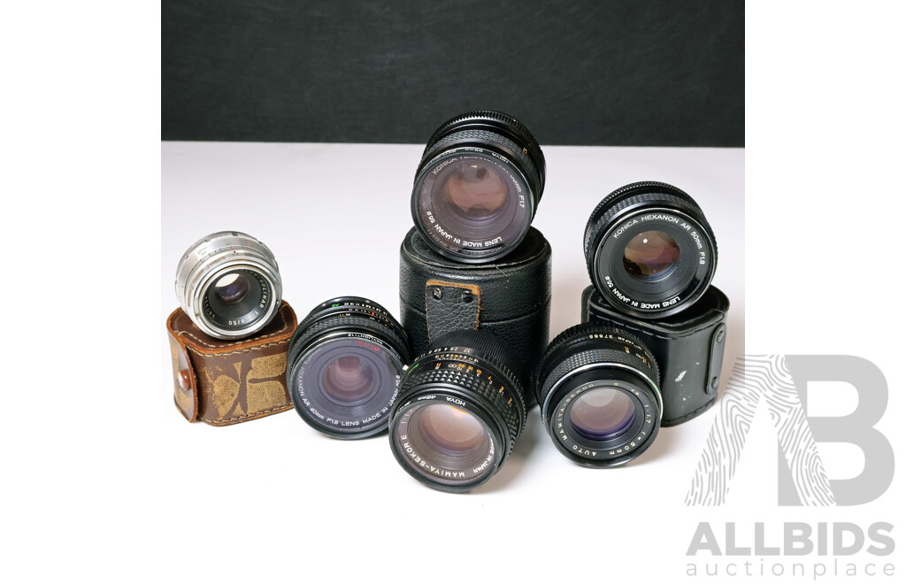 Collection of Vintage Standard Prime Lenses Including Konica and Mamiya