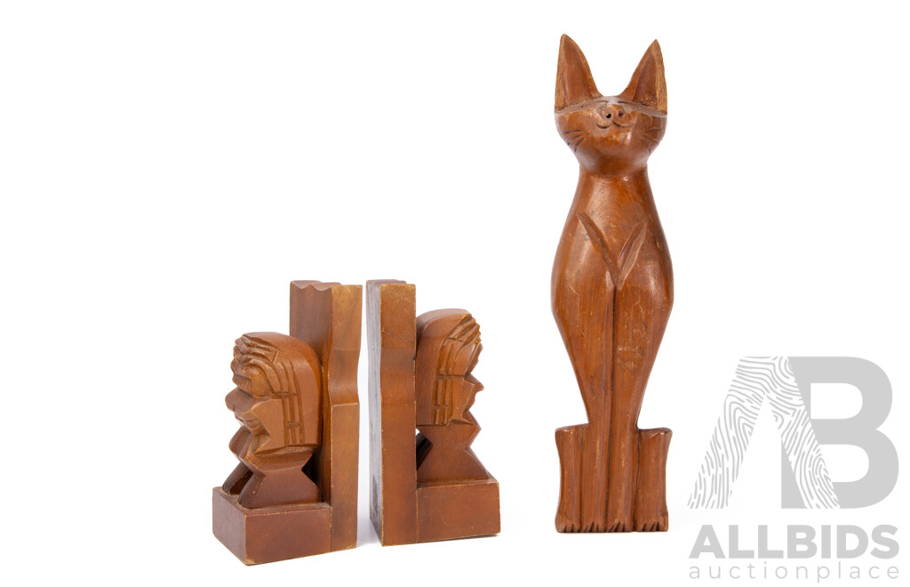 Collection Of Teak Items Pair Of 1980s Maori Tiki Carved Bookends And A Hand Carved Cat