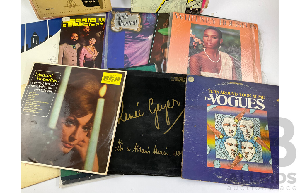 Collection of Vinyl Records Including Linda Ronstadt, Whitney Houston, Seals & Crofts, Sergio Menes and More