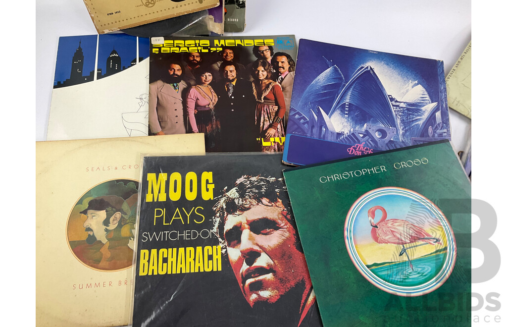 Collection of Vinyl Records Including Linda Ronstadt, Whitney Houston, Seals & Crofts, Sergio Menes and More