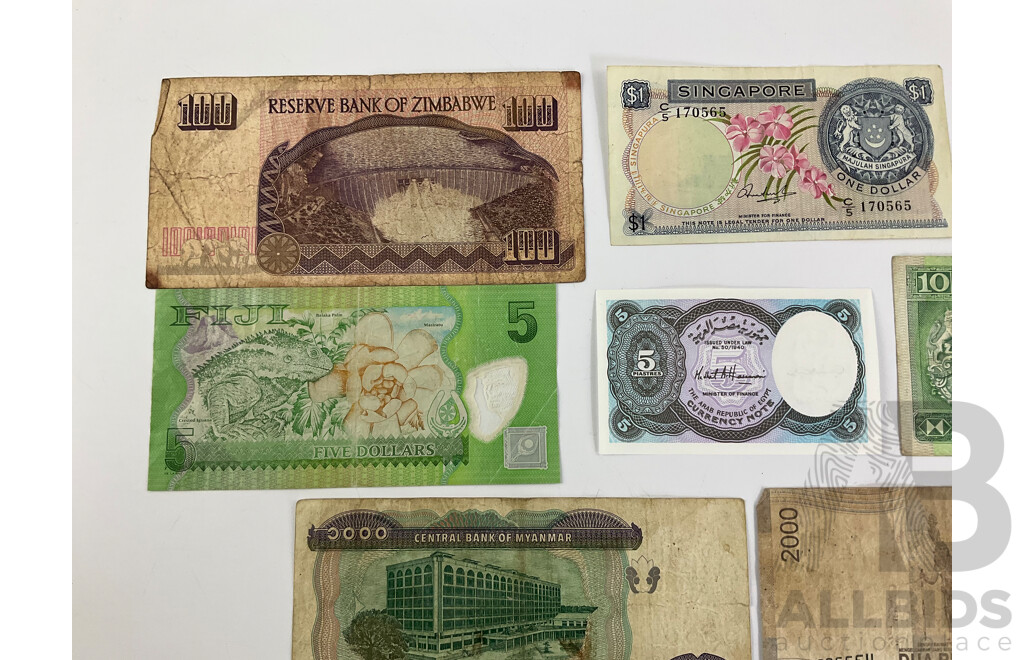 Collection of International Bank Notes, Including Fiji, Egypt, Zimbabwe, Singapore, Myanmar, Italy, Indonesia, Hong Kong, Brazil
