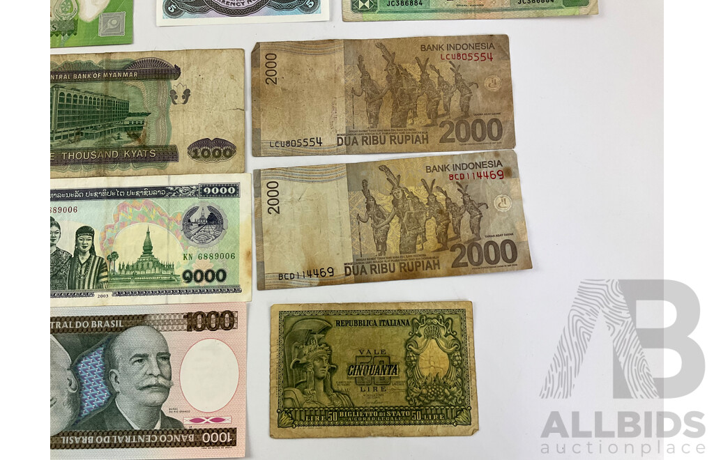 Collection of International Bank Notes, Including Fiji, Egypt, Zimbabwe, Singapore, Myanmar, Italy, Indonesia, Hong Kong, Brazil
