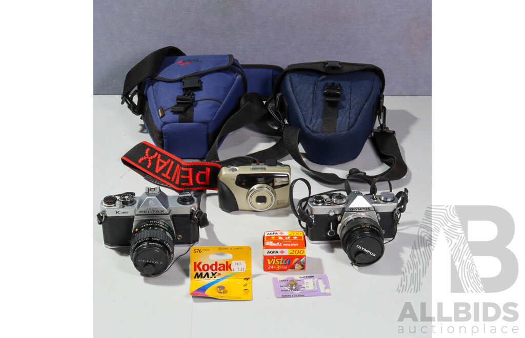 Asahi Pentax K100 Camera in Soft Case, Olympus OM 1 Camera in Soft Case and Espio 105G Digital Camera
