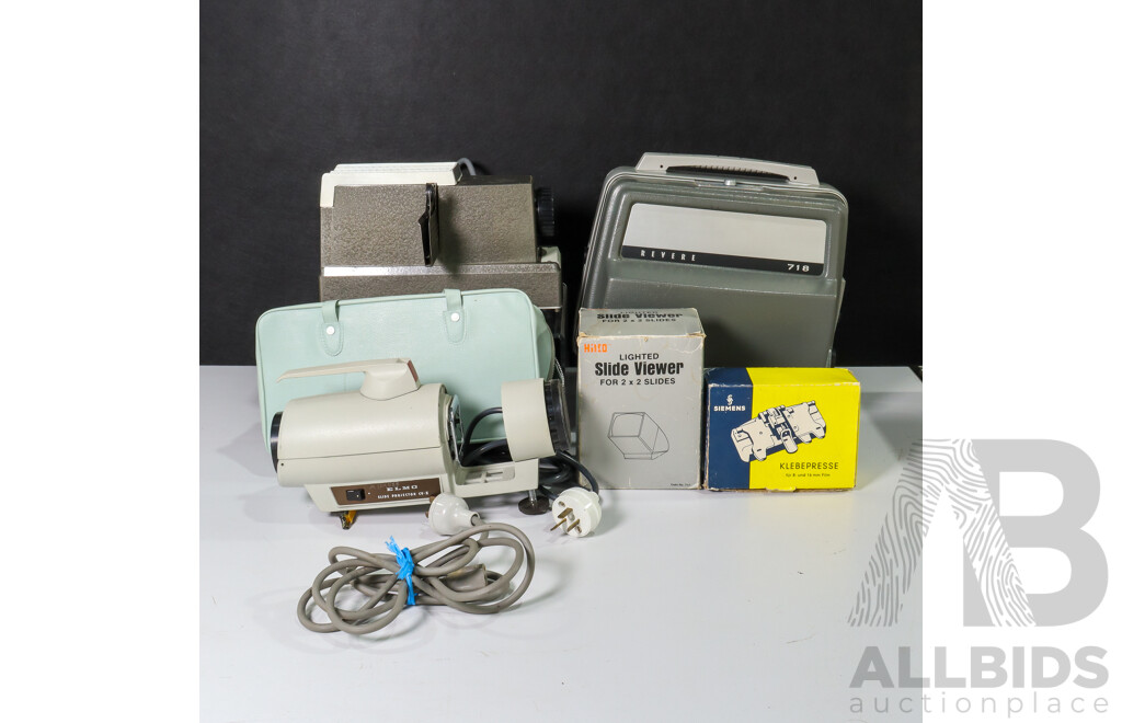 Collection of Vintage Movie Equipment Including Revere 718 8mm Film Projector, Bell & Howell Slide Projector, Siemens Film Splicer, Lighted Slide Viewer and Elmo Slide Projectior