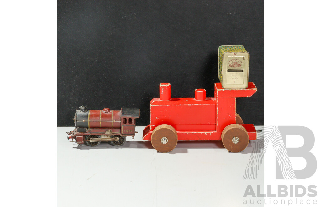 Vintage Hornby OO Gauge Clockwork Steam Locomotive, Timber Toy Steam Locomotive and Vintage Commonwealth Bank Money Tin