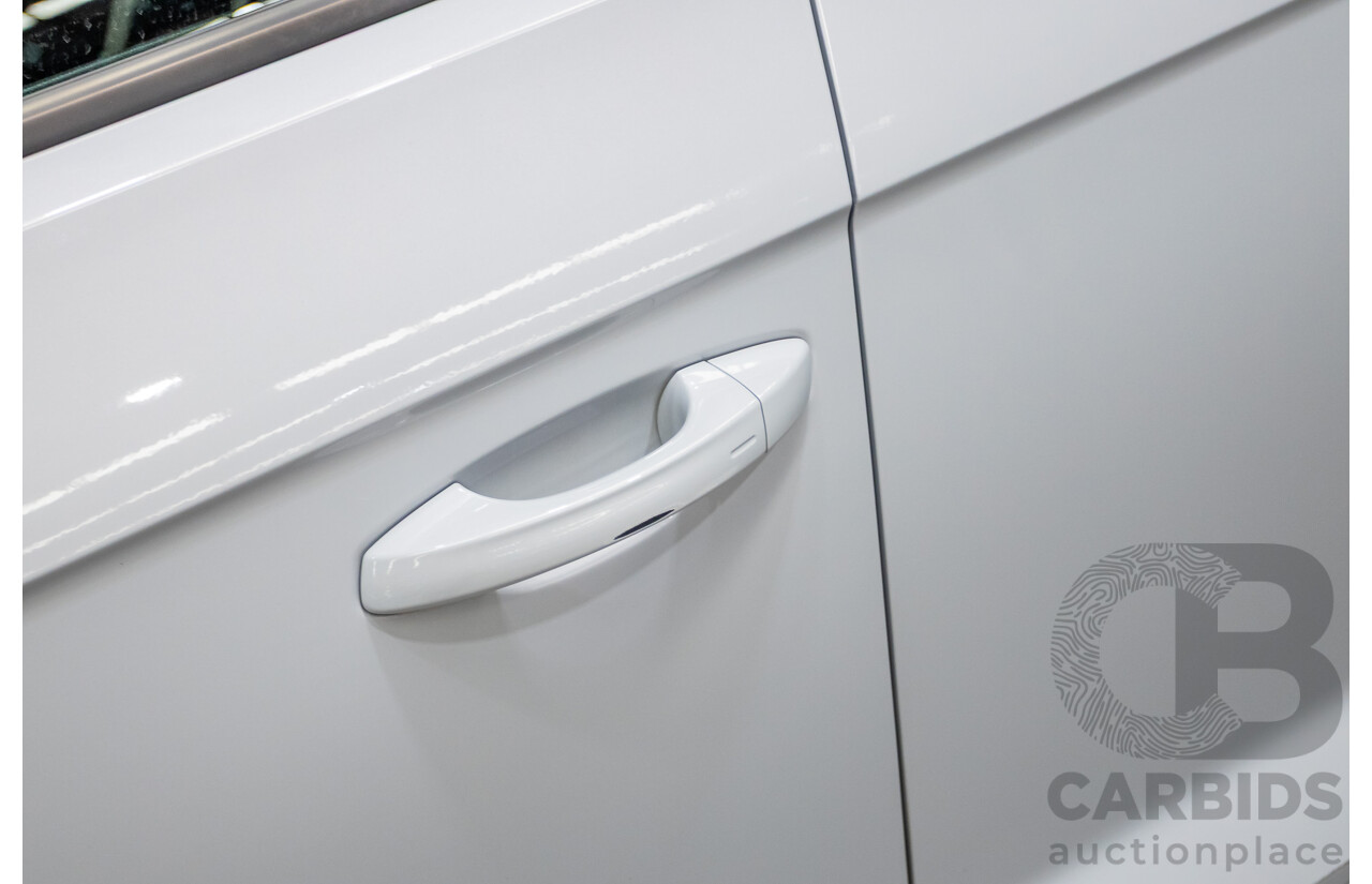 09/2021 Volkswagen T-Roc 140TSI SPORT (AWD) A1 MY21 4D Wagon White Silver Metallic Turbo 2.0L