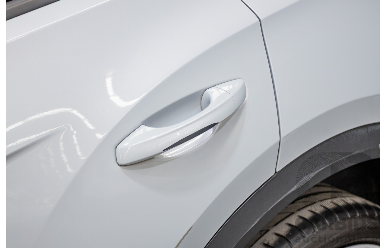 09/2021 Volkswagen T-Roc 140TSI SPORT (AWD) A1 MY21 4D Wagon White Silver Metallic Turbo 2.0L