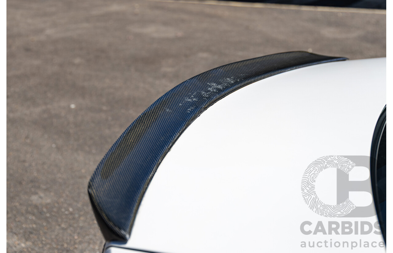 08/2012 Mercedes Benz C63 AMG W204 MY12 4d Sedan Designo Diamond White Bright Metallic V8 6.3L