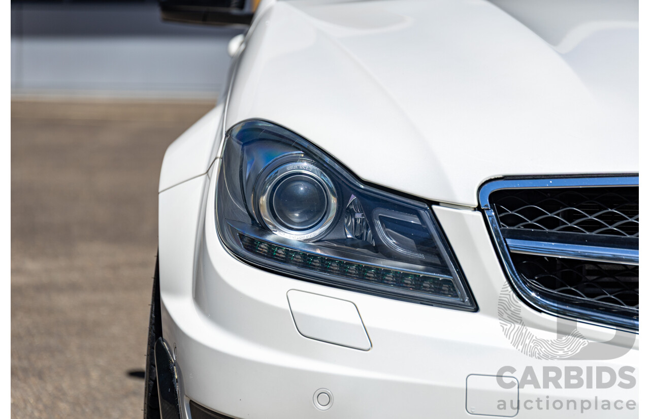 08/2012 Mercedes Benz C63 AMG W204 MY12 4d Sedan Designo Diamond White Bright Metallic V8 6.3L