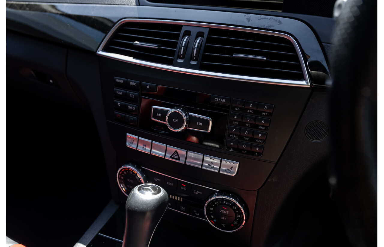 08/2012 Mercedes Benz C63 AMG W204 MY12 4d Sedan Designo Diamond White Bright Metallic V8 6.3L