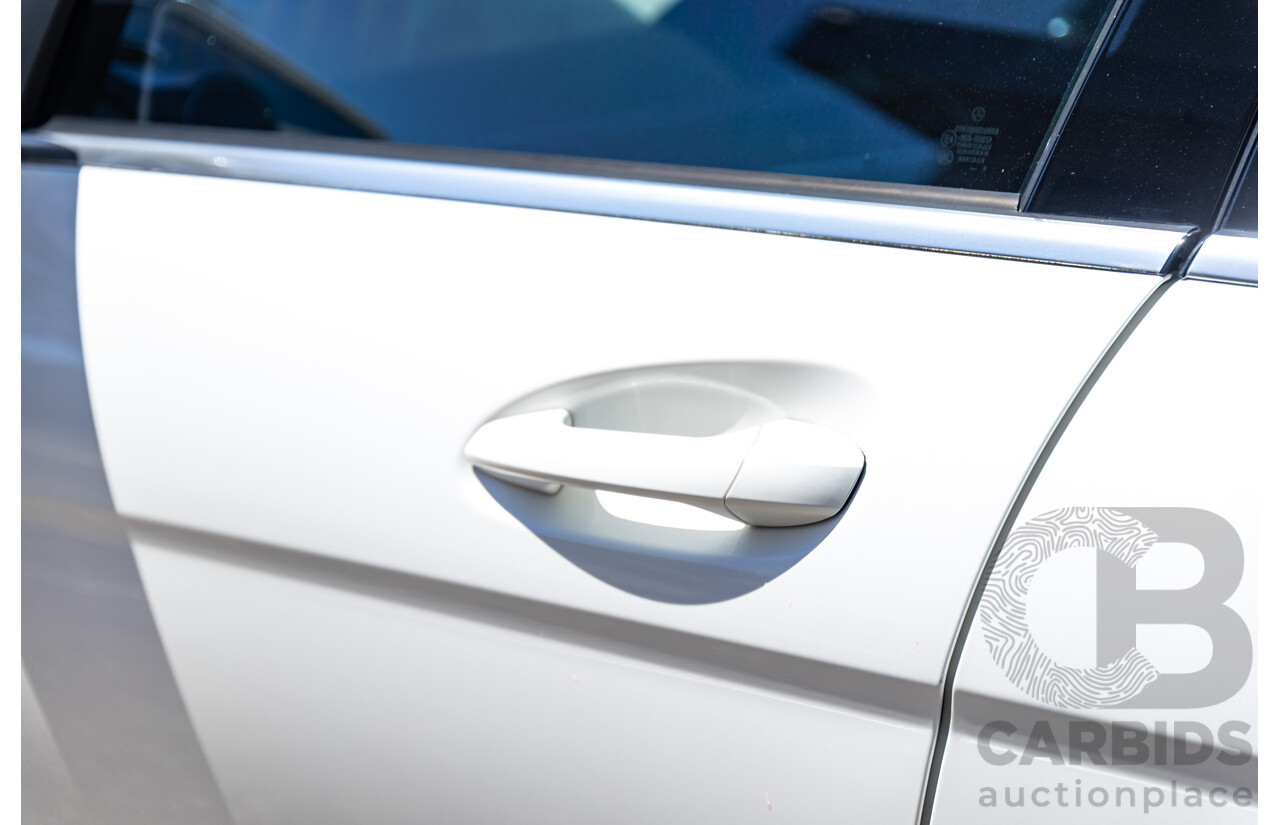 08/2012 Mercedes Benz C63 AMG W204 MY12 4d Sedan Designo Diamond White Bright Metallic V8 6.3L