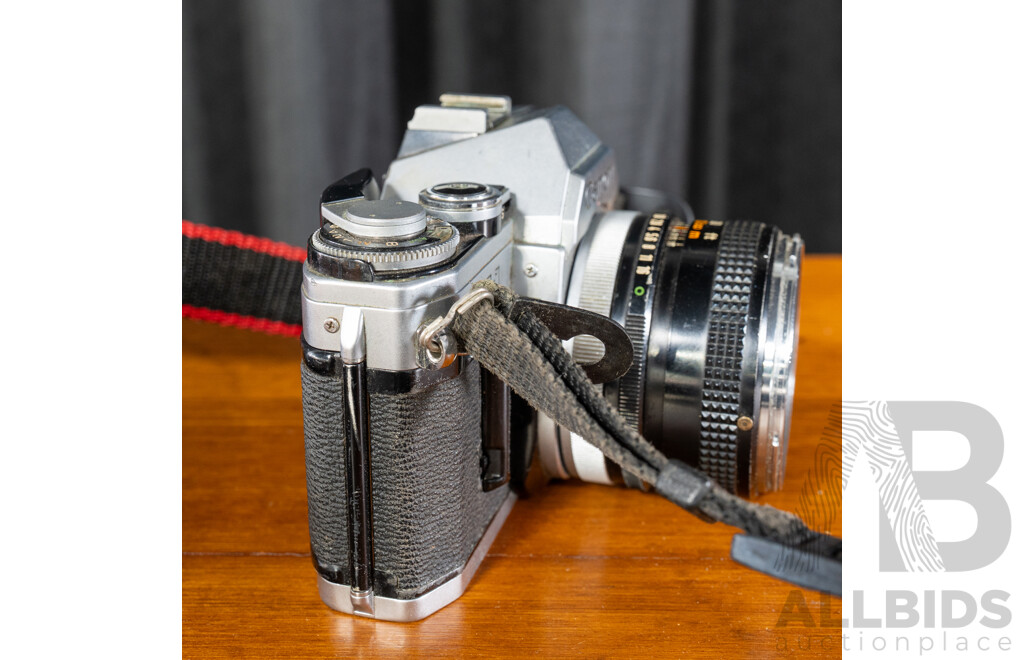 Vintage Canon AE-1 35mm SLR Camera with Canon FD 50mm F/1.8 Lens