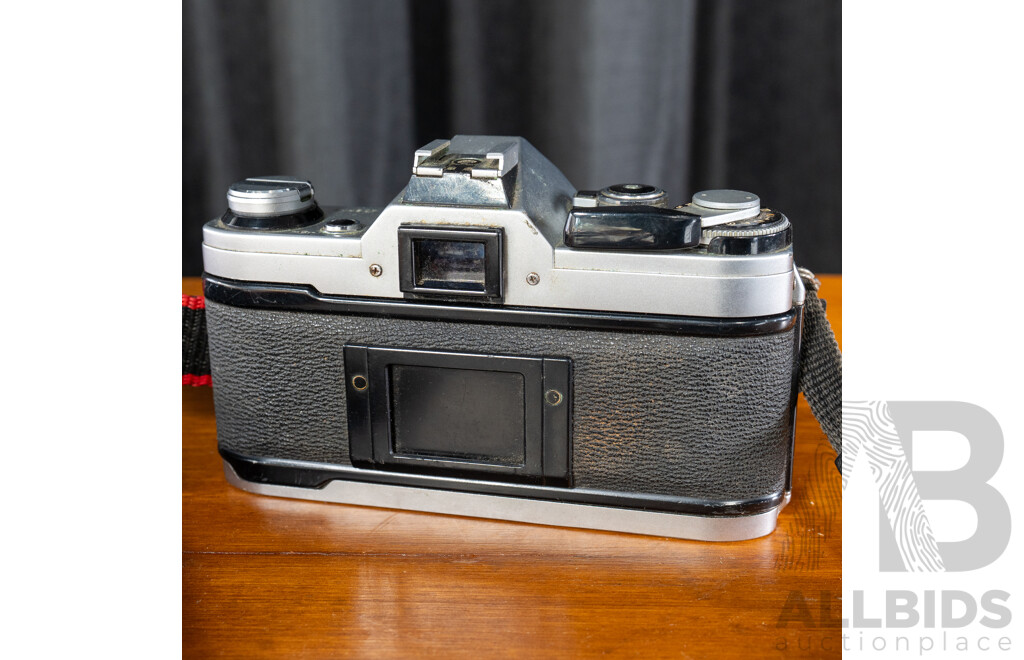 Vintage Canon AE-1 35mm SLR Camera with Canon FD 50mm F/1.8 Lens