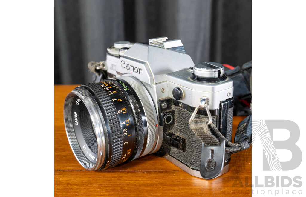 Vintage Canon AE-1 35mm SLR Camera with Canon FD 50mm F/1.8 Lens