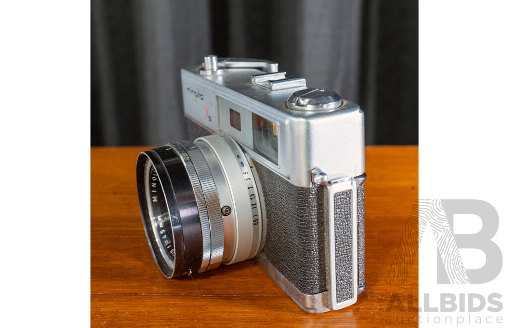 Vintage Minolta Hi-Matic 7s 35mm Film Rangefinder Camera with Rokkor-PF 45mm f/1.8 Lens