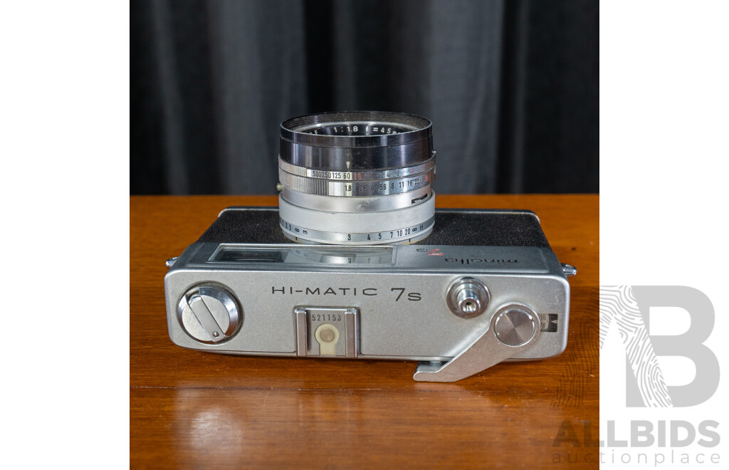 Vintage Minolta Hi-Matic 7s 35mm Film Rangefinder Camera with Rokkor-PF 45mm f/1.8 Lens