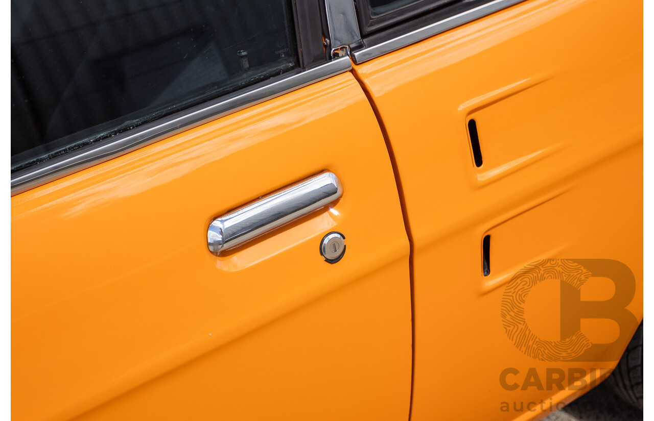 6/1971 Datsun 1200 Deluxe 2d Coupe Orange Turbo 1.8L - Modified & Engineered