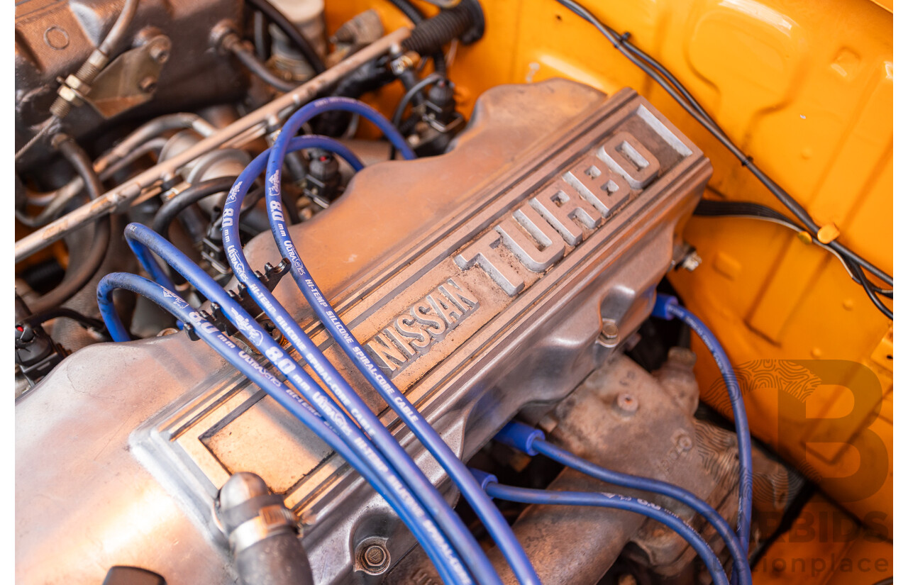 6/1971 Datsun 1200 Deluxe 2d Coupe Orange Turbo 1.8L - Modified & Engineered