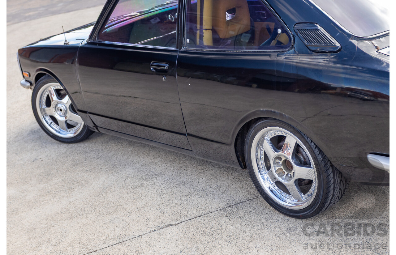 1/1973 Toyota Corolla KE20 2d Sedan Black Ported Rotary 2.3L - Modified & Engineered