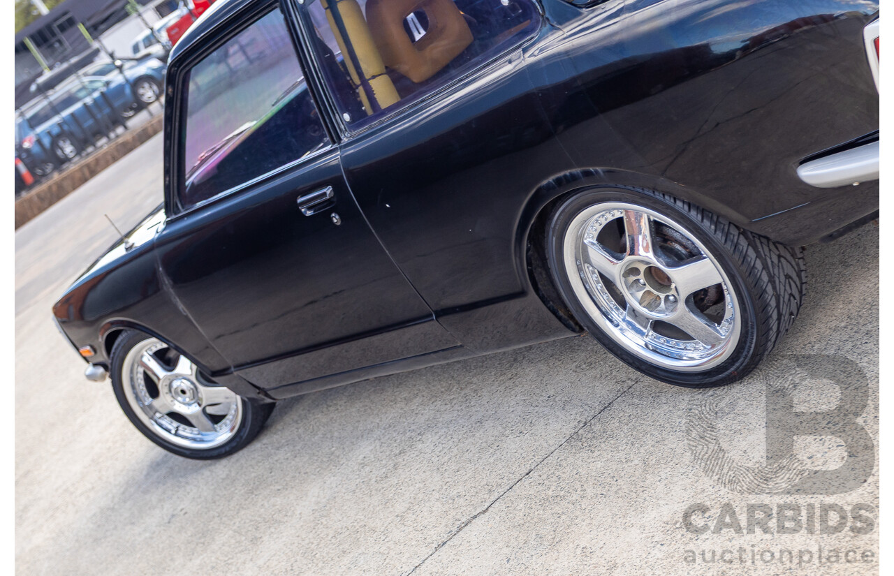 1/1973 Toyota Corolla KE20 2d Sedan Black Ported Rotary 2.3L - Modified & Engineered