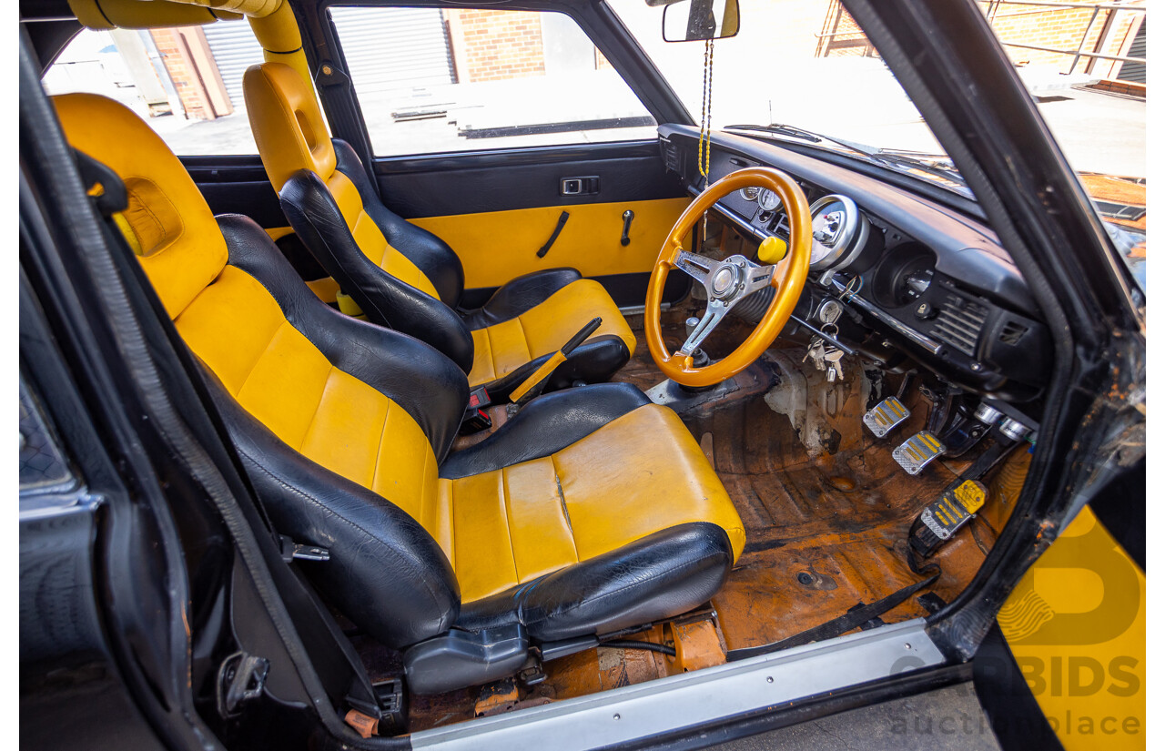 1/1973 Toyota Corolla KE20 2d Sedan Black Ported Rotary 2.3L - Modified & Engineered