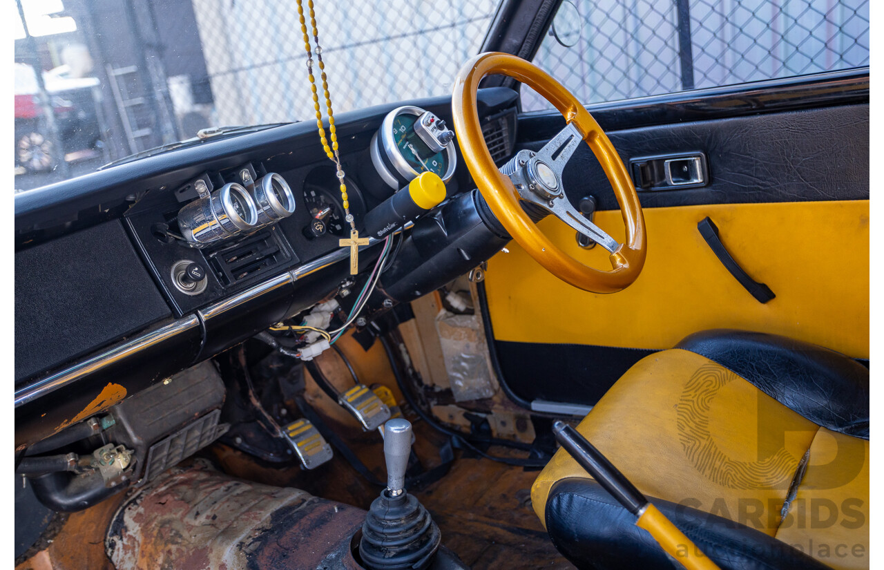 1/1973 Toyota Corolla KE20 2d Sedan Black Ported Rotary 2.3L - Modified & Engineered