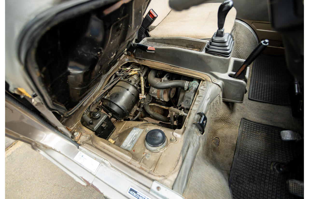 8/1987 Suzuki Super Carry Van DA21V 2d Van Brown 1.0L